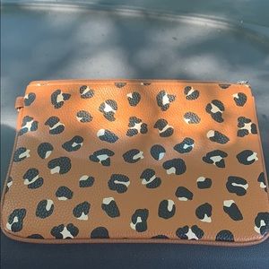 Thirty- one animal print clutch